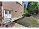 Brick home with covered patio and level lawn; great for outdoor entertaining at 2123 Floral Ridge Dr, Dacula, GA 30019
