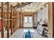 Spacious unfinished basement area with a walkout to the exterior and ample sunlight at 2123 Floral Ridge Dr, Dacula, GA 30019