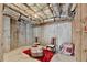 Unfinished basement ready for renovation with exposed insulation and visible utilities at 2123 Floral Ridge Dr, Dacula, GA 30019