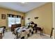 Charming bedroom with a quilt, vintage furniture, and natural light from the large window at 2123 Floral Ridge Dr, Dacula, GA 30019