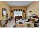 Cozy bedroom with a vintage dresser, patchwork quilt and decorative accents at 2123 Floral Ridge Dr, Dacula, GA 30019