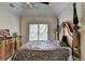 Cozy bedroom featuring a queen-sized bed, and window with blinds at 2123 Floral Ridge Dr, Dacula, GA 30019