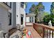 Outdoor deck with seating area and decor, providing a perfect spot for relaxation at 2123 Floral Ridge Dr, Dacula, GA 30019