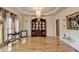 Chic dining room with hardwood floors, chandelier, and stylish furniture at 2123 Floral Ridge Dr, Dacula, GA 30019