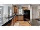 Well-appointed kitchen with modern appliances, granite countertops, and wooden cabinetry at 2123 Floral Ridge Dr, Dacula, GA 30019