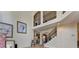 Bright and airy living room with staircase and view of the upper level at 2123 Floral Ridge Dr, Dacula, GA 30019