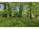 Backyard with mature trees at 2202 Green Forrest Dr, Decatur, GA 30032