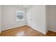 Bedroom with hardwood floors, natural light, closet, and neutral walls at 2202 Green Forrest Dr, Decatur, GA 30032