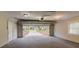 Spacious garage with open door, concrete floor, and access to driveway at 2202 Green Forrest Dr, Decatur, GA 30032