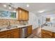 Kitchen with stainless steel appliances, granite counters and view of the dining room at 2202 Green Forrest Dr, Decatur, GA 30032