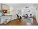 Cozy living area with hardwood floors, neutral decor, and a view of the kitchen at 2202 Green Forrest Dr, Decatur, GA 30032