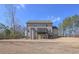 Spacious backyard view, showcasing the deck and well-maintained landscape at 7751 Capps Ridge Ln, Douglasville, GA 30135
