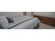 Relaxing bedroom featuring a comfortable bed, soft lighting and dresser at 7751 Capps Ridge Ln, Douglasville, GA 30135