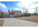 Charming home with a spacious driveway and a well-maintained front yard at 7751 Capps Ridge Ln, Douglasville, GA 30135