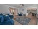 Open-concept living room provides seamless access to the kitchen and staircase, creating an inviting atmosphere at 7751 Capps Ridge Ln, Douglasville, GA 30135