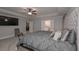 Tranquil main bedroom with plush carpeting and a view of ensuite bathroom at 7751 Capps Ridge Ln, Douglasville, GA 30135