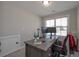 Well lit office with desk, dual monitors, and a window at 7751 Capps Ridge Ln, Douglasville, GA 30135