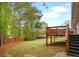 Expansive backyard with mature trees, offering plenty of room to play and relax outdoors at 974 Shirley Se St, Smyrna, GA 30082