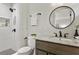 Modern bathroom featuring a walk-in shower, sleek vanity, and stylish fixtures at 974 Shirley Se St, Smyrna, GA 30082