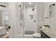Stylish bathroom featuring a tiled shower with black fixtures and gray and white accents at 974 Shirley Se St, Smyrna, GA 30082