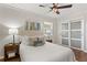 Stylish bedroom with a comfortable bed, modern decor, and sliding closet doors at 974 Shirley Se St, Smyrna, GA 30082