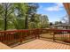 Relax on this wooden deck overlooking the lush backyard, ideal for outdoor entertaining at 974 Shirley Se St, Smyrna, GA 30082