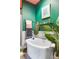 Bathroom with a soaking tub, towel ladder and tropical inspired decoration at 130 Arizona Ne Ave # 415, Atlanta, GA 30307