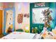 Vibrant bedroom with a bright neon sign and an oversized mirror at 130 Arizona Ne Ave # 415, Atlanta, GA 30307