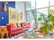 Eclectic living room showcasing colorful accents, a plush sofa, and an abundance of natural light at 130 Arizona Ne Ave # 415, Atlanta, GA 30307