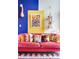 Comfortable living room featuring colorful throw pillows and decor with eclectic accents at 130 Arizona Ne Ave # 415, Atlanta, GA 30307