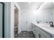 Bright bathroom features double sinks, granite countertops, modern fixtures, and decorative flooring at 1616 Ruskin Way, Marietta, GA 30062