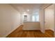 Hallway with hardwood floors, a large storage closet and white trim at 1616 Ruskin Way, Marietta, GA 30062