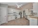 Bright kitchen with white cabinets, stainless appliances, and wood countertops, offering a clean and functional space at 501 Woodland Trce, Woodstock, GA 30189