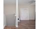 Bright bonus room features modern flooring and neutral paint at 521 Mirramont Pl, Woodstock, GA 30189