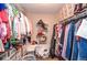 Spacious walk-in closet with ample storage and organization at 521 Mirramont Pl, Woodstock, GA 30189
