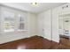 Bedroom with white trim and plantation shutters over a large window at 746 N Highland Ne Ave # 6, Atlanta, GA 30306