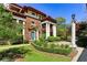 Charming brick building featuring symmetrical columns and lush landscaping in a residential neighborhood at 746 N Highland Ne Ave # 6, Atlanta, GA 30306