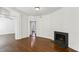Bright living room showcasing hardwood floors and seamless doorway to another room at 746 N Highland Ne Ave # 6, Atlanta, GA 30306