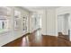 Hardwood floored living room with natural light and balcony access through glass doors at 746 N Highland Ne Ave # 6, Atlanta, GA 30306