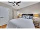 Inviting bedroom with hardwood floors and neutral colors with plenty of closet space at 934 Pine Cir, Woodstock, GA 30189
