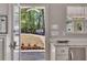 View from the kitchen to the slate-tiled patio at 934 Pine Cir, Woodstock, GA 30189