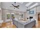 Bright living room with a fireplace, hardwood floors, built-in shelves, and lots of natural light at 934 Pine Cir, Woodstock, GA 30189