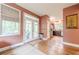 Spacious entryway with hardwood floors, leading to the kitchen and sunroom at 1745 Mary Lou Ln, Atlanta, GA 30316