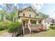 Charming two-story home with a inviting front porch and landscaped front yard at 1745 Mary Lou Ln, Atlanta, GA 30316