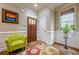 Bright foyer with hardwood floors, a colorful rug, and stylish decor at 1745 Mary Lou Ln, Atlanta, GA 30316