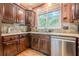 Charming kitchen with granite countertops, stainless steel appliances, and ample natural light at 1745 Mary Lou Ln, Atlanta, GA 30316