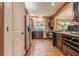 Well-equipped kitchen with stainless steel appliances, granite countertops, and ample cabinet space with wine rack at 1745 Mary Lou Ln, Atlanta, GA 30316