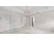 View of main bedroom featuring double closets, a chandelier, and access to the main bathroom at 2550 Columbia Crossing Ct, Decatur, GA 30034