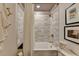 Well-lit bathroom features a shower over tub with white subway tile and a shower curtain for privacy at 2685 Maple Park Pl # 27, Cumming, GA 30041