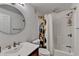Well-lit bathroom with a shower-tub combo and modern fixtures at 2685 Maple Park Pl # 27, Cumming, GA 30041